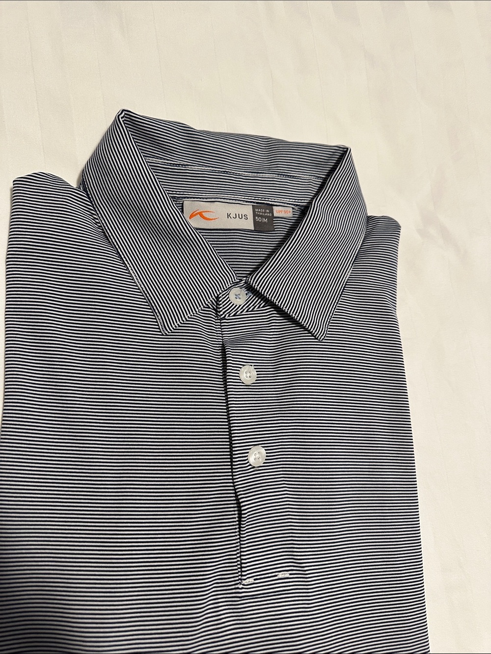 KJUS: Men's Navy/White Striped Performance Polo